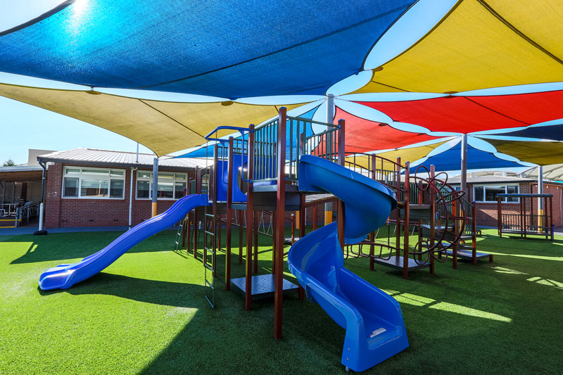 sirius college, activity playgrounds, school, kids, playground, older kids, large, big, double blue plastic slide, spiral slide, melbourne, victoria, australia