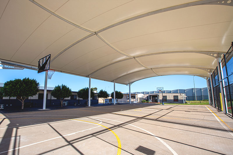 Barrel Shade, Sirius College, Under cover, basketball area, shade, sail, steel posts, giant, huge, large, basketball, court, assembly, area